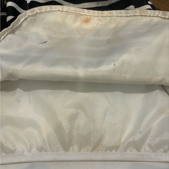 Scout Black and white backpack made with poly canvas
Wipe clean with damp towel - Picture 11 of 16